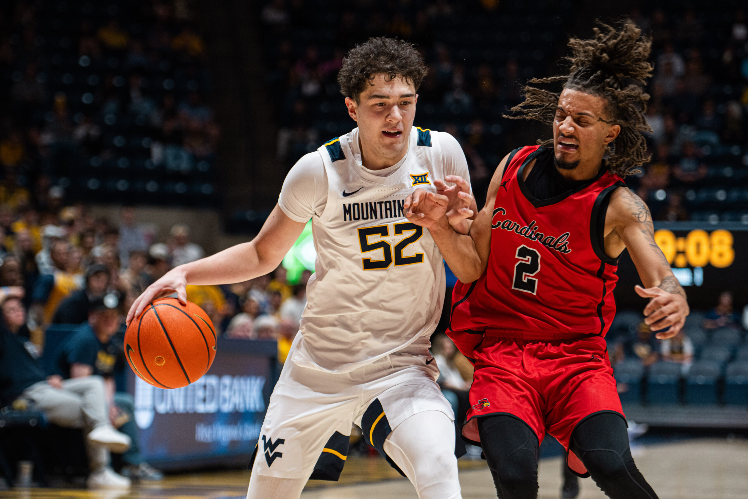 WVU men's hoops powers its way to exhibition win over Wheeling University